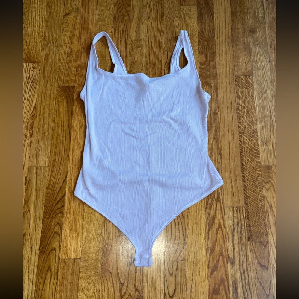 Purple SKIMS bodysuit